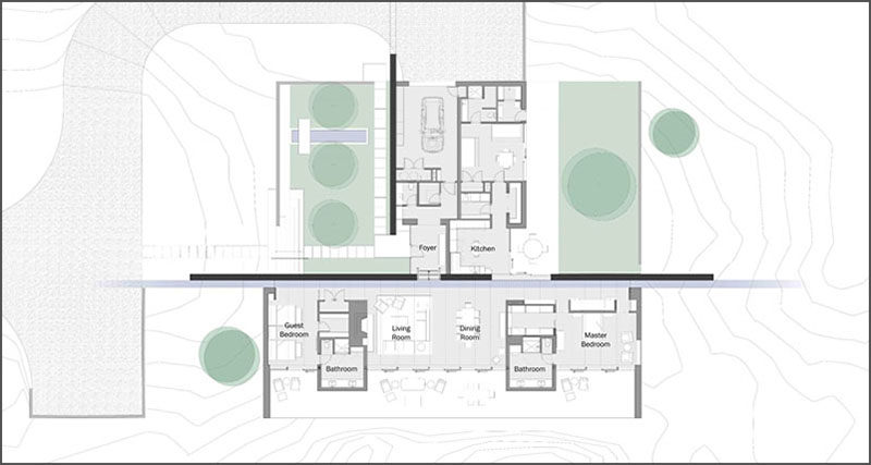 Specht Architects have recently completed this modern house in Santa Fe, New Mexico, that's organised around two perpendicular board-formed concrete walls.