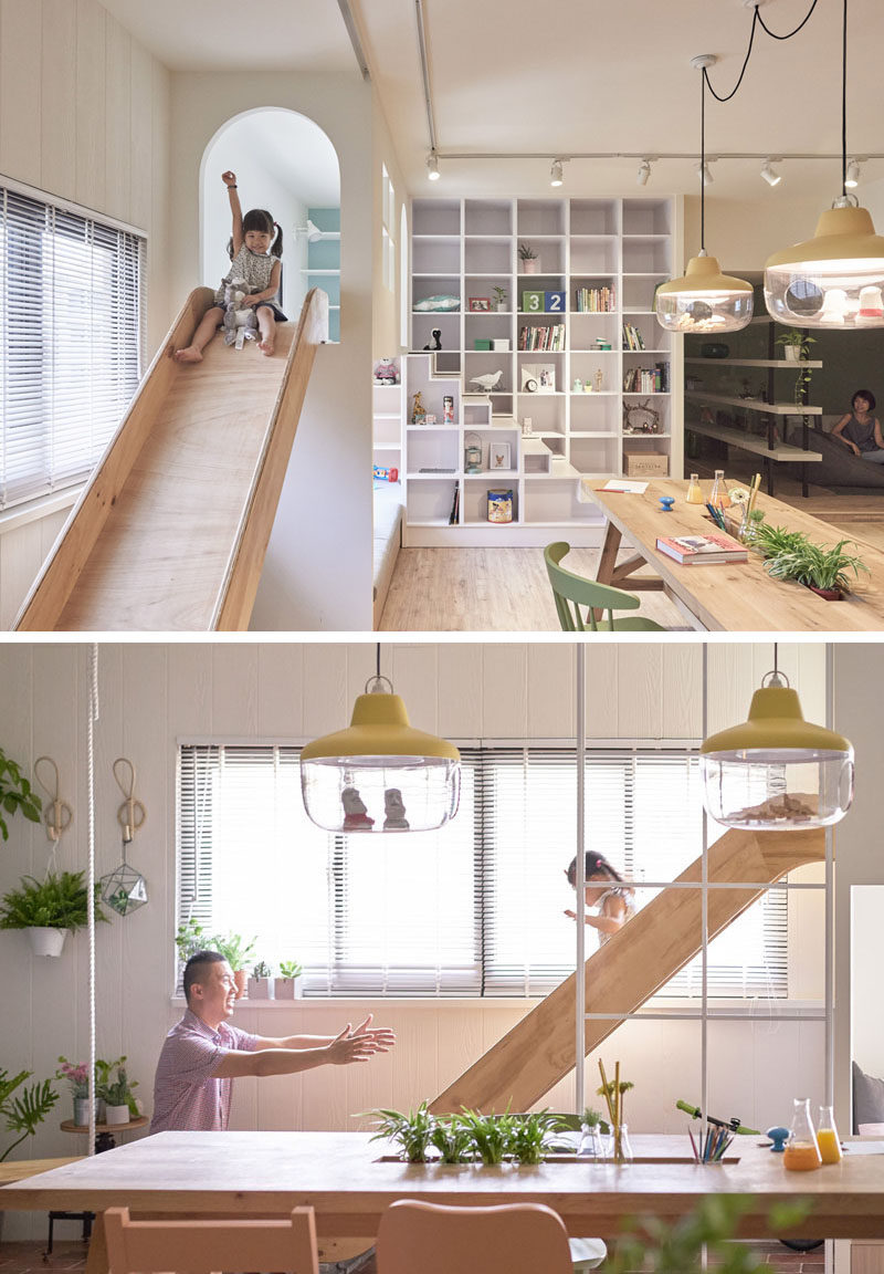 This modern apartment features a lofted play space just off the kitchen with a wood slide attached to it, making it super quick to come down for snacks.