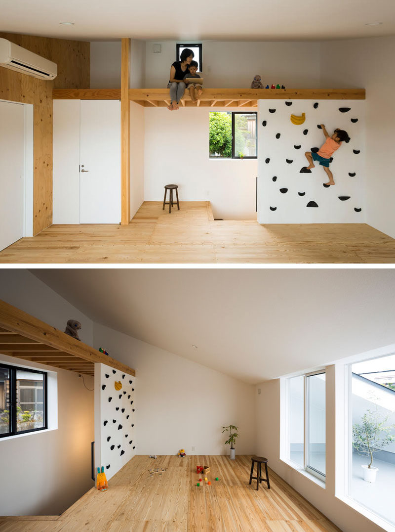 The small rock climbing wall in this modern house leads up to a lofted space that can be used for playing, reading, napping, or just hanging out. #RockClimbingWall #InteriorRockClimbingWalls #InteriorDesign