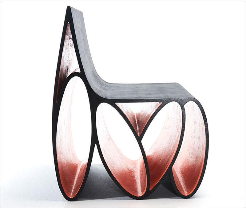 Jason Mizrahi has designed the Loop Chair, a sculptural wood chair made from ash with a lacquered ebony finished veneer.