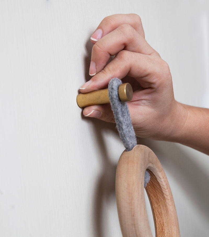 KNOTSstudio have created a modern wall hook that's made from beech wood circles, metal wall pegs and felt tabs. Each individual hook can be positioned wherever you like to create a unique look for your home decor.