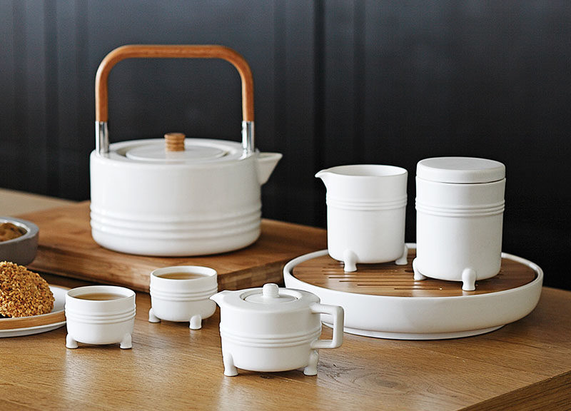 All the pieces of this white tea set have tiny feet that help them rest securely on the table or surface they're placed on.