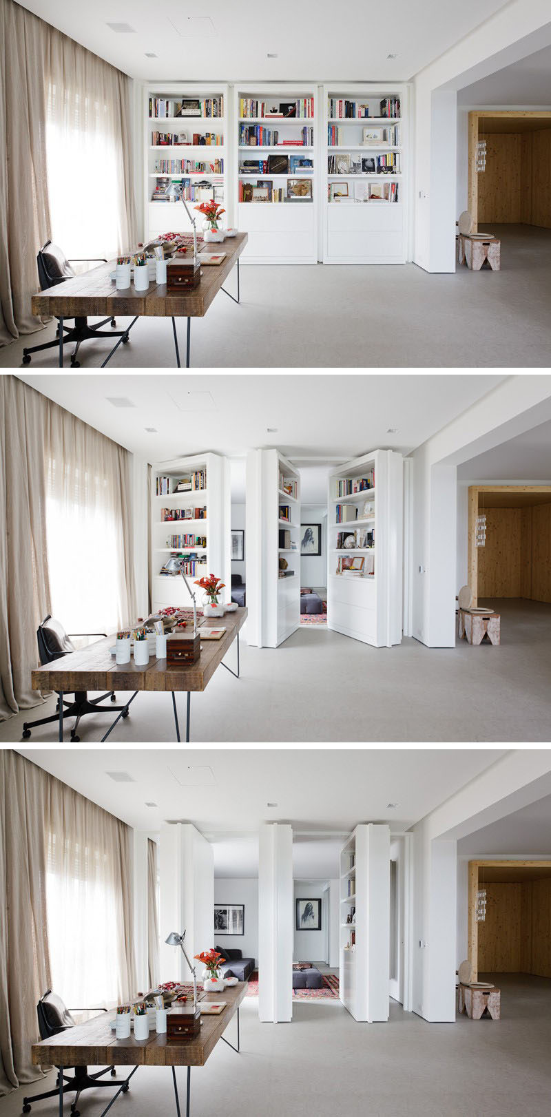 This modern home office has built-in white pivoting bookshelves that are also secret doors that can be opened to reveal a private living room.