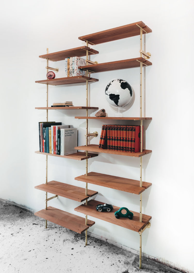 Using brass and Sapele wood, Toronto-based designer Ryan Taylor, has created Brass Rail Shelving, a fully customizable modern shelving system.