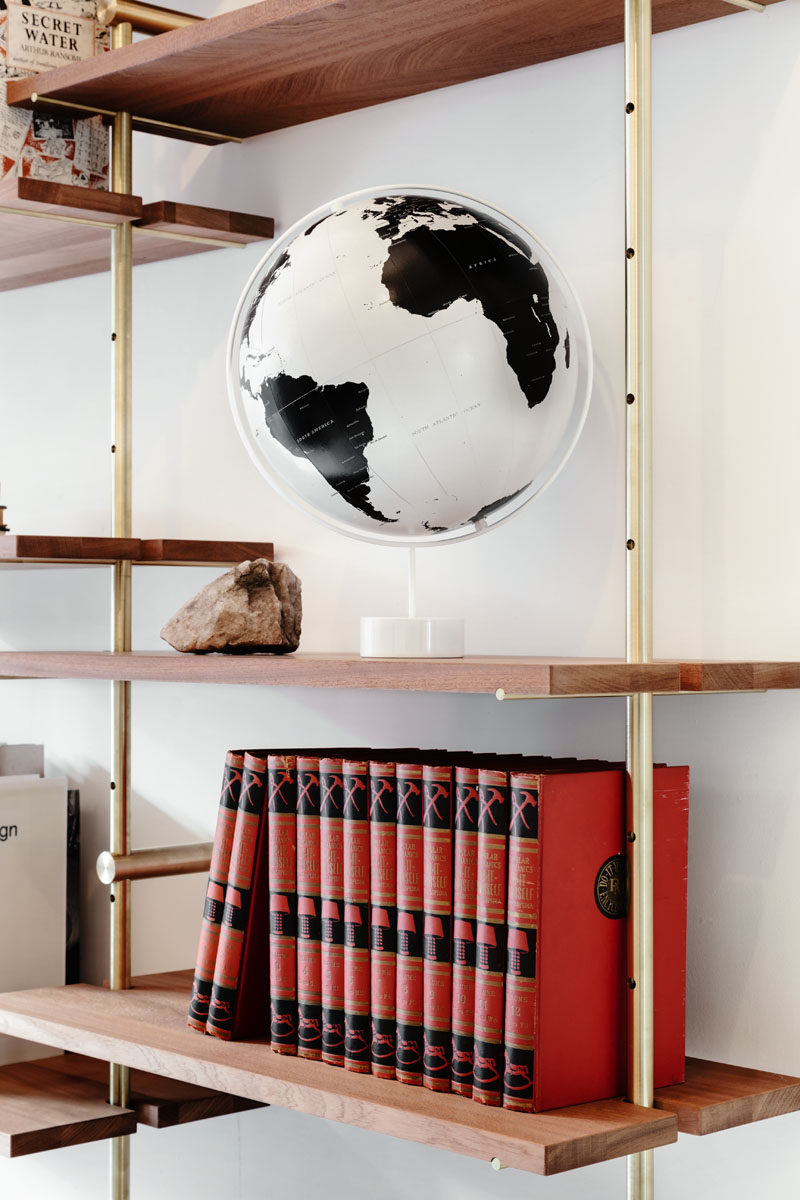 Using brass and Sapele wood, Toronto-based designer Ryan Taylor, has created Brass Rail Shelving, a fully customizable modern shelving system.
