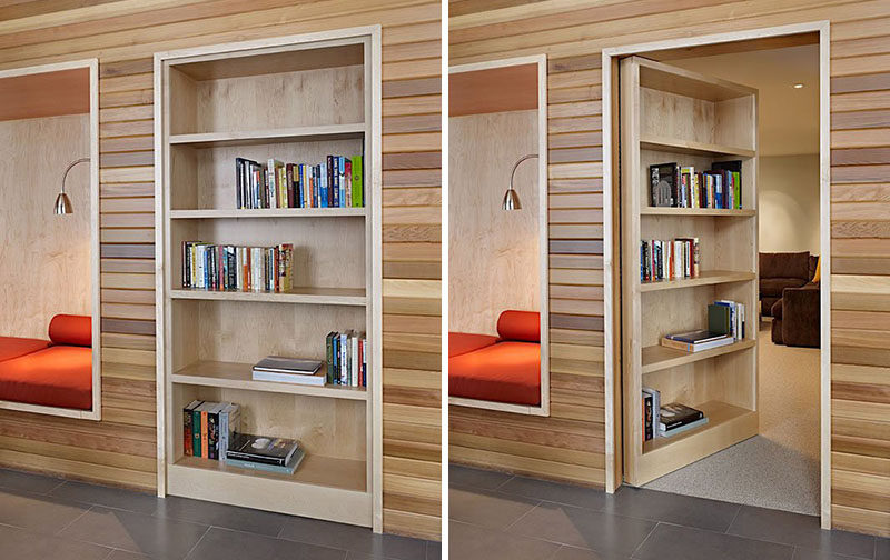 The built-in wooden bookshelf in this modern office becomes a secret door that can be pushed open to reveal a quiet and cozy hidden reading room.