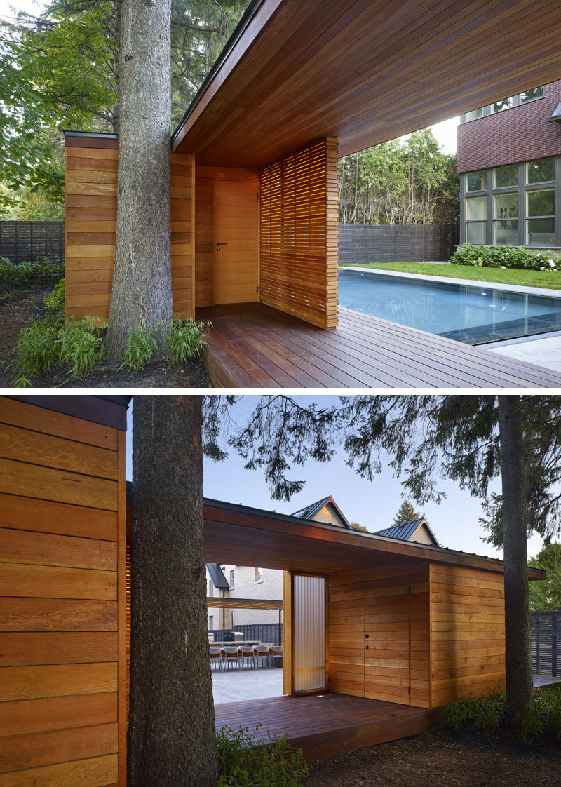 This modern pool house, which is mostly made from wood and sits at the end of the backyard, is the main focal point in the yard and hides the neighboring house. Slats of Douglas Fir screen the front of the pavilion and provide privacy for the interior spaces.