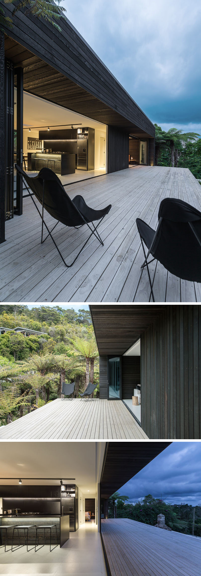 At the top of the stairs, the light wood steps expand out into a deck for this modern house, and glass bi-fold doors make the home perfect for indoor/outdoor living.