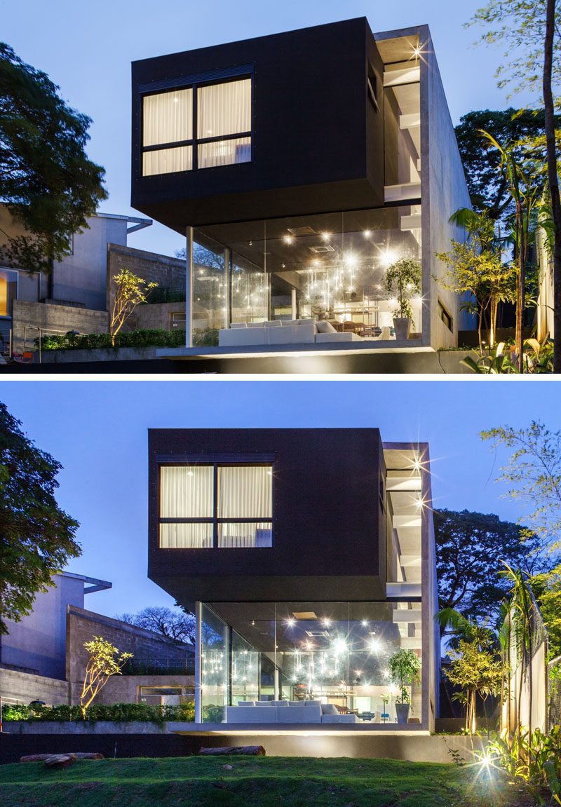 FGMF Arquitetos have designed this modern house in São Paulo, Brazil, for a young family, that sits on a steep slope and has views of the city.