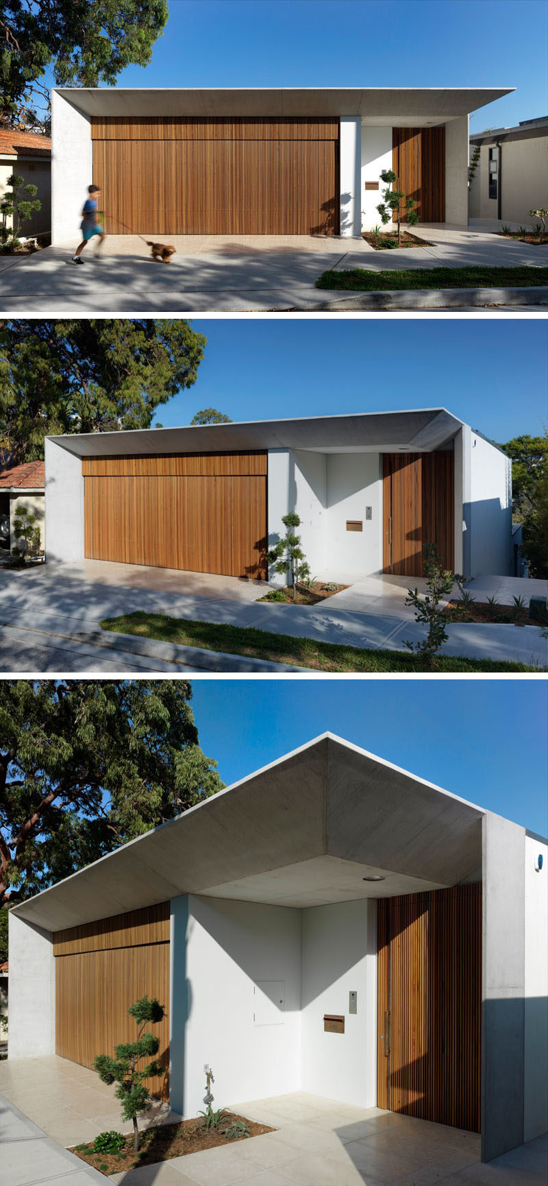 From the street, this modern house has a wood garage that matches the front door. The front door has been slightly set back to provide some protection from the elements.