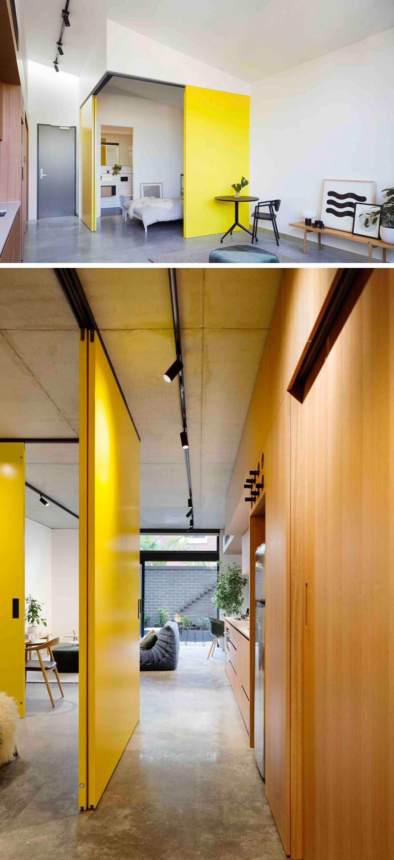 This modern apartment has bright yellow doors that slide open to reveal the bedroom, and the living room opens up to a private courtyard.