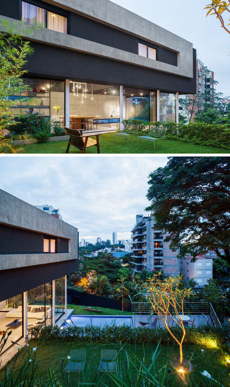 This modern house has glass walls can be slid open so that the home owners can have access to the garden and swimming pool outside.