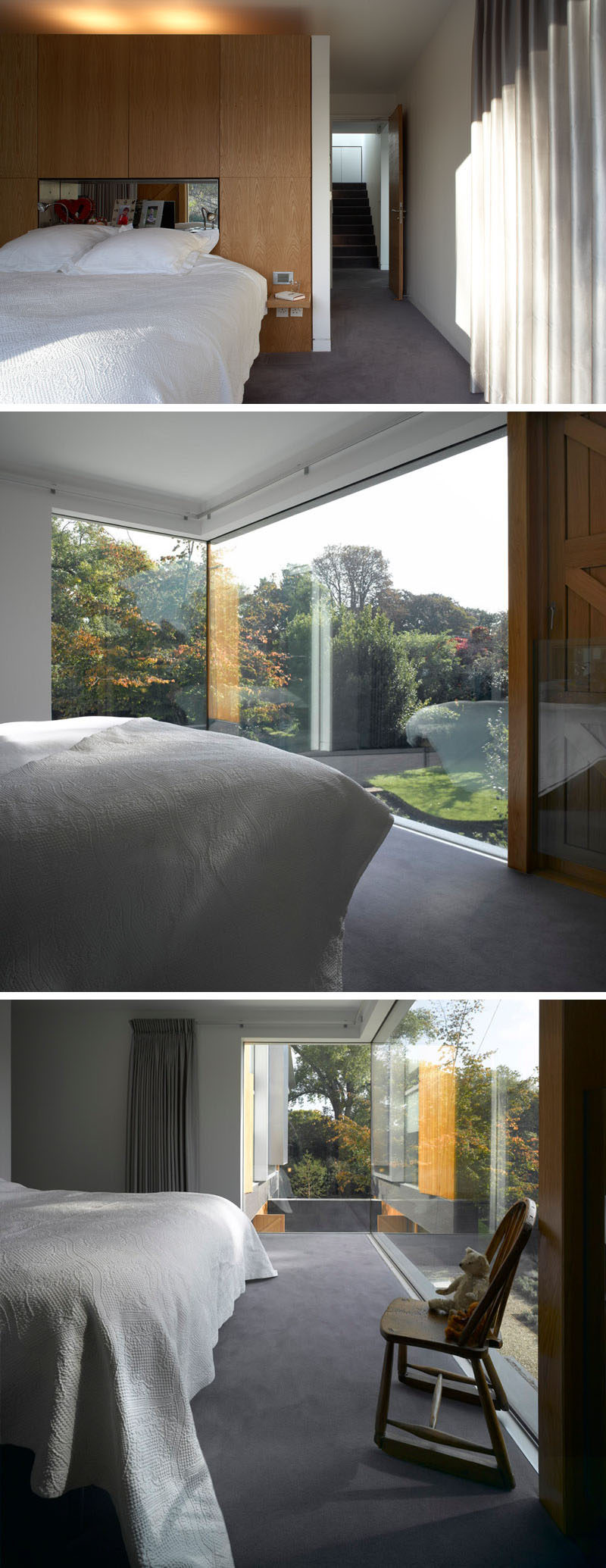 This modern master bedroom has a custom wood headboard with a mirrored shelf, and at the end of the bed are floor-to-ceiling windows that wrap around the corner. 