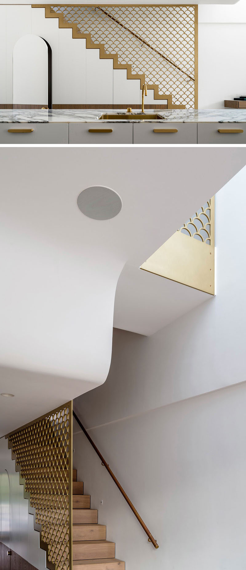 The stairs leading to the upper floors of this modern house have a brass finish balustrade with the fish scale pattern, providing an artistic feature that also meets the building code. The ceiling is also slightly artistic, in that it has been sculpted to negotiate the split level and allows for a light well over the living room.