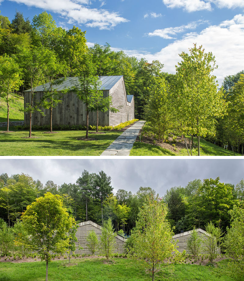 This modern house, which is split into two asymmetric gable roof forms, is clad in a siding composed of re-purposed snow fencing, so that it already has the natural beauty of the weathered boards.