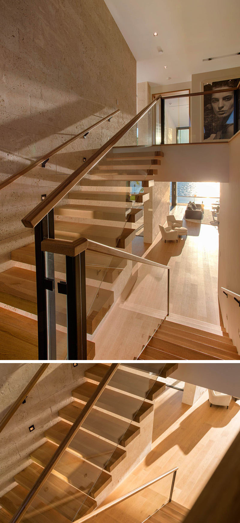 Light wood stairs with glass railings lead to the upper floor of this modern home.