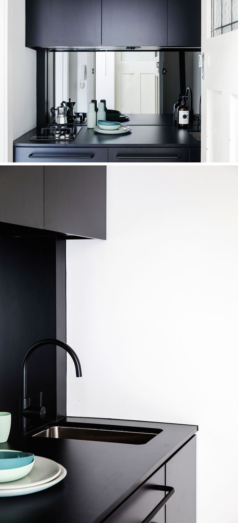 Stepping inside this tiny apartment, you walk straight into a small kitchen. The matte black cabinets stand out, and a mirrored backsplash helps to make the space appear larger.