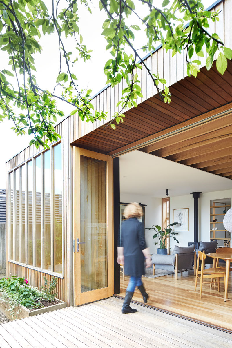 This modern 'Wooden Box' house extension uses Tasmanian Oak for the windows and exposed beams, Cedar for the siding, and Blackbutt for the wood flooring.