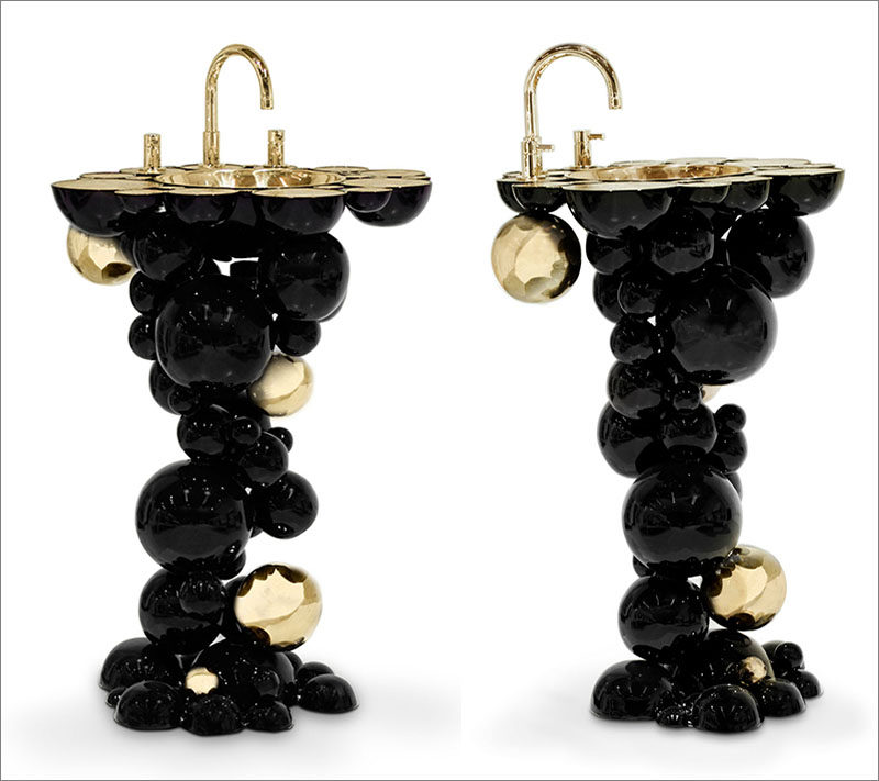 Designer Joaquim Paulo has designed the Newton Collection for Maison Valentina, that includes a bathtub and washbasins that have a black bubbly exterior and a rich gold interior.
