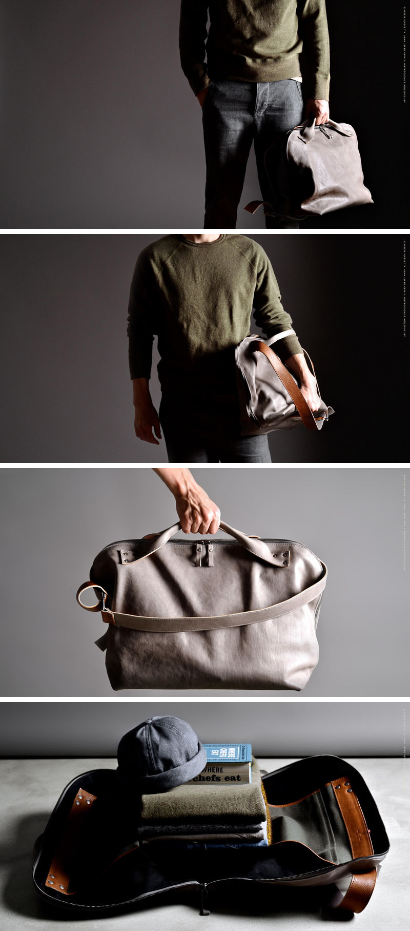 Whether you throw it over your shoulder or carry it by the handles this light grey, modern leather weekend bag will have you looking super stylish.