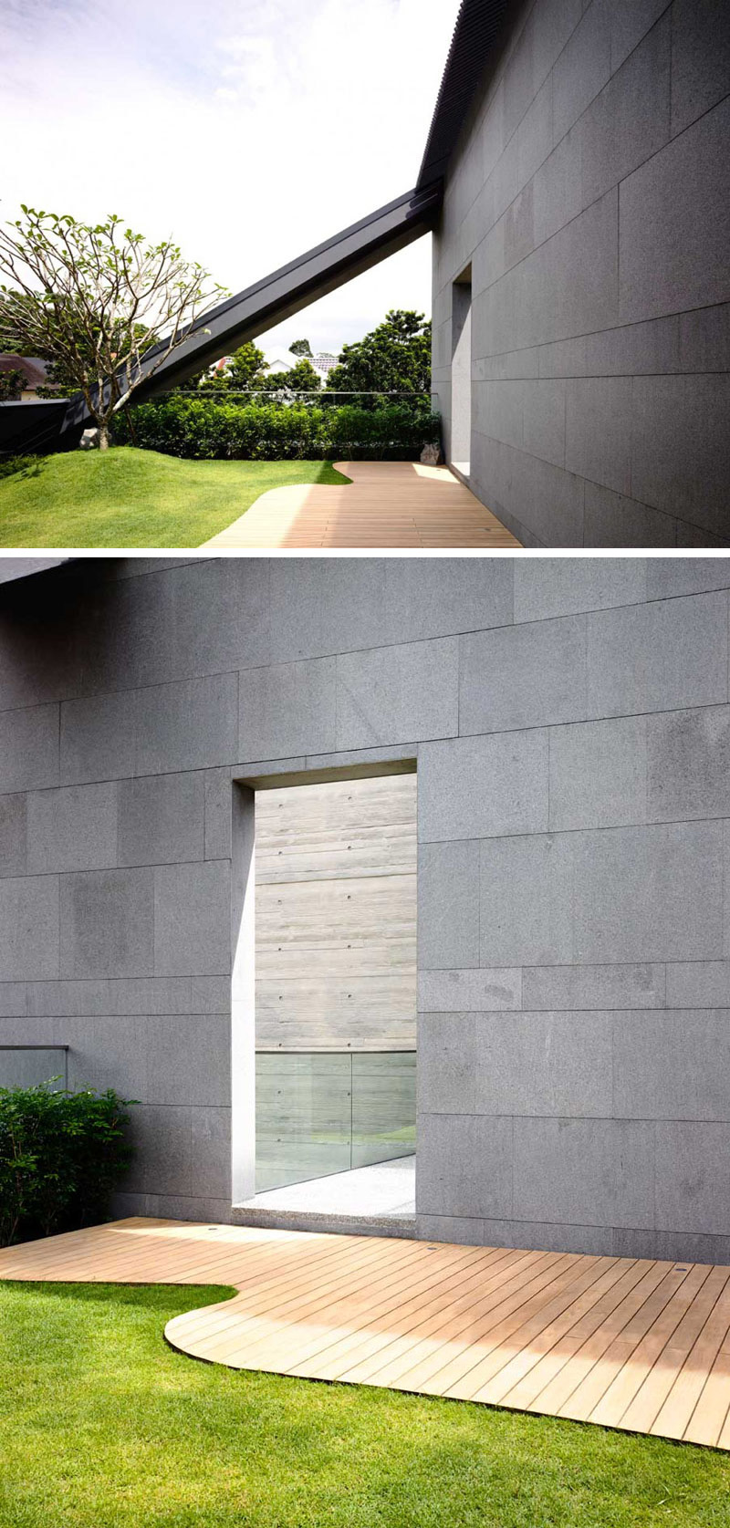 A slightly curved wood walkway leads along the back of this modern home. 