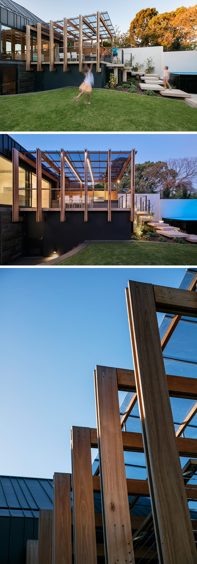 This house has an outdoor entertaining area with a modern pergola and deck, offering both light and shelter. The glass roof sitting on top of the wood fins protects furniture and people from getting wet when it rains, and the wood fins includes LED strips built into them to create a soft light for the outdoor space.