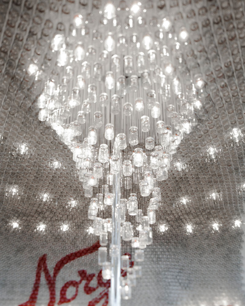 This large, modern and delicate chandelier in an airport bar in Oslo, is made from glass jars.