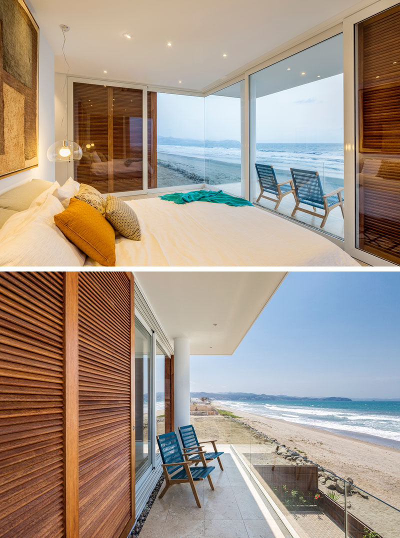 Simplistic lighting and a corner window keep the bedroom bright, and allow for the view of the beach to be the most important element in the room. 