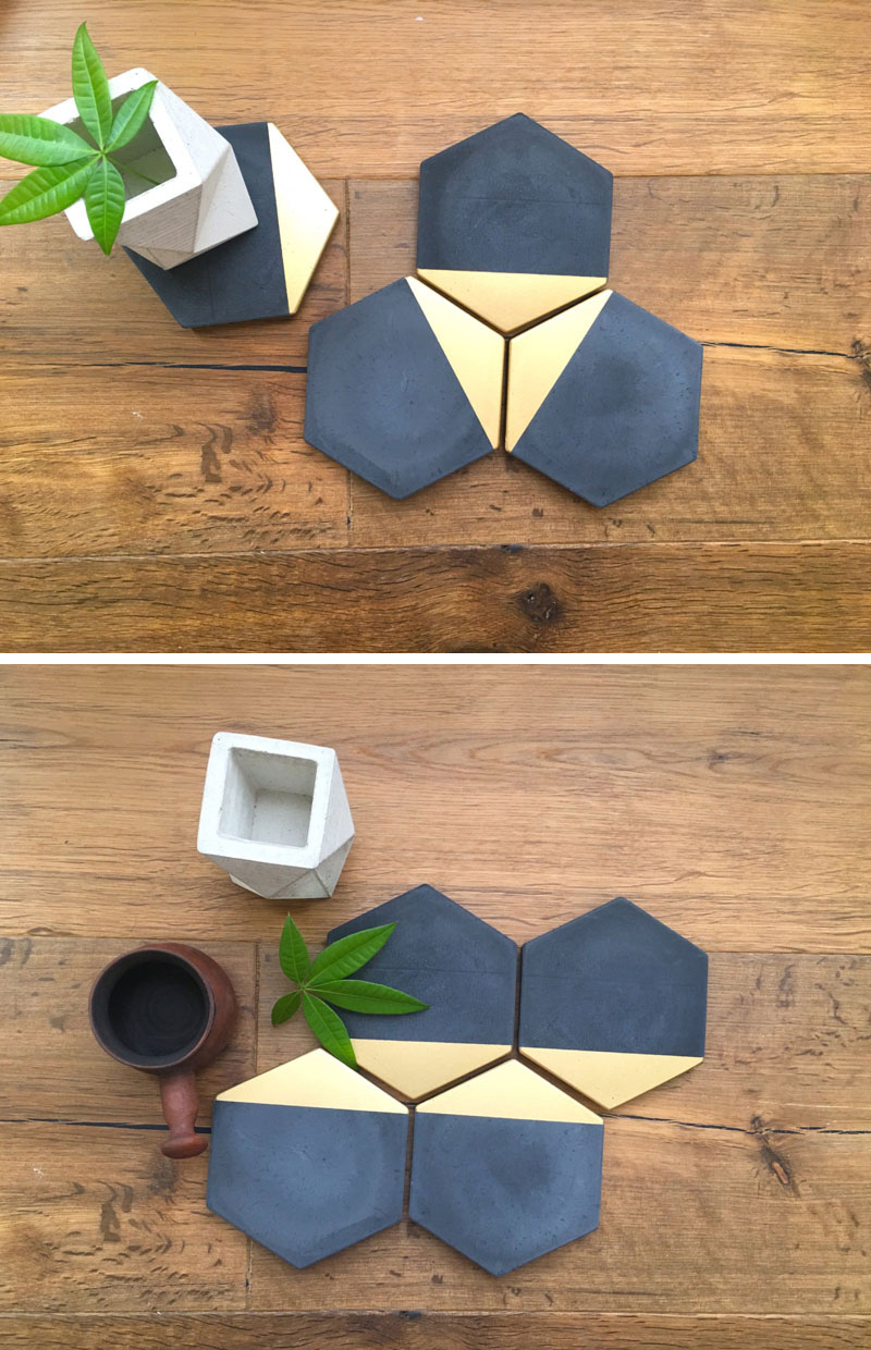 These black hexagonal concrete coasters are modern with gold painted on a single edge.