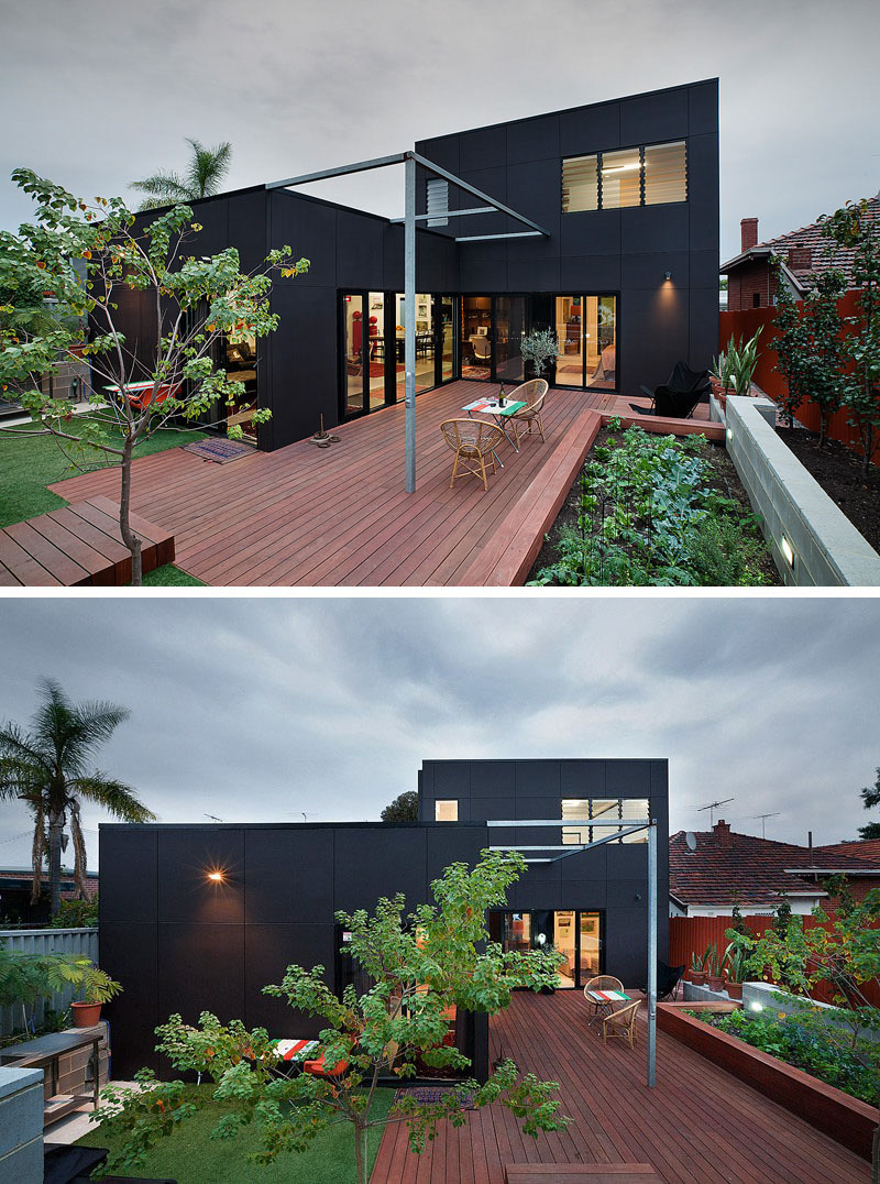 The two storey extension on this modern home is covered in black siding to give it a contemporary look. #ModernBlackHouse #BlackHouse #BlackExterior #BlackArchitecture