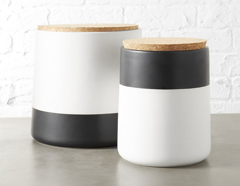 Bold in black and white, these modern dipped stoneware canisters are smooth with a matte finish, and can spice up any decor instantaneously. #PantryIdeas #StorageIdeas #KitchenStorage #KitchenJars #ModernJar #ModernCanister #PantryJars