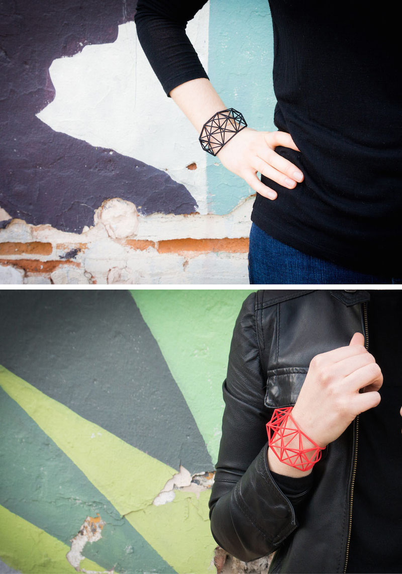 These modern geometric bracelets are black and red, and are 3D printed using nylon and plastic as the main materials. 