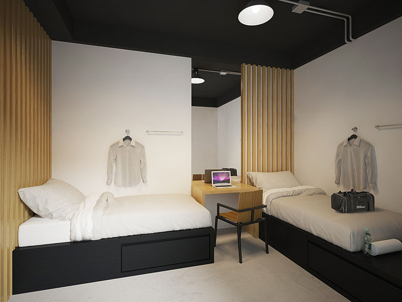 This modern hostel in Bangkok has private rooms with wood slat accents that double as headboards.