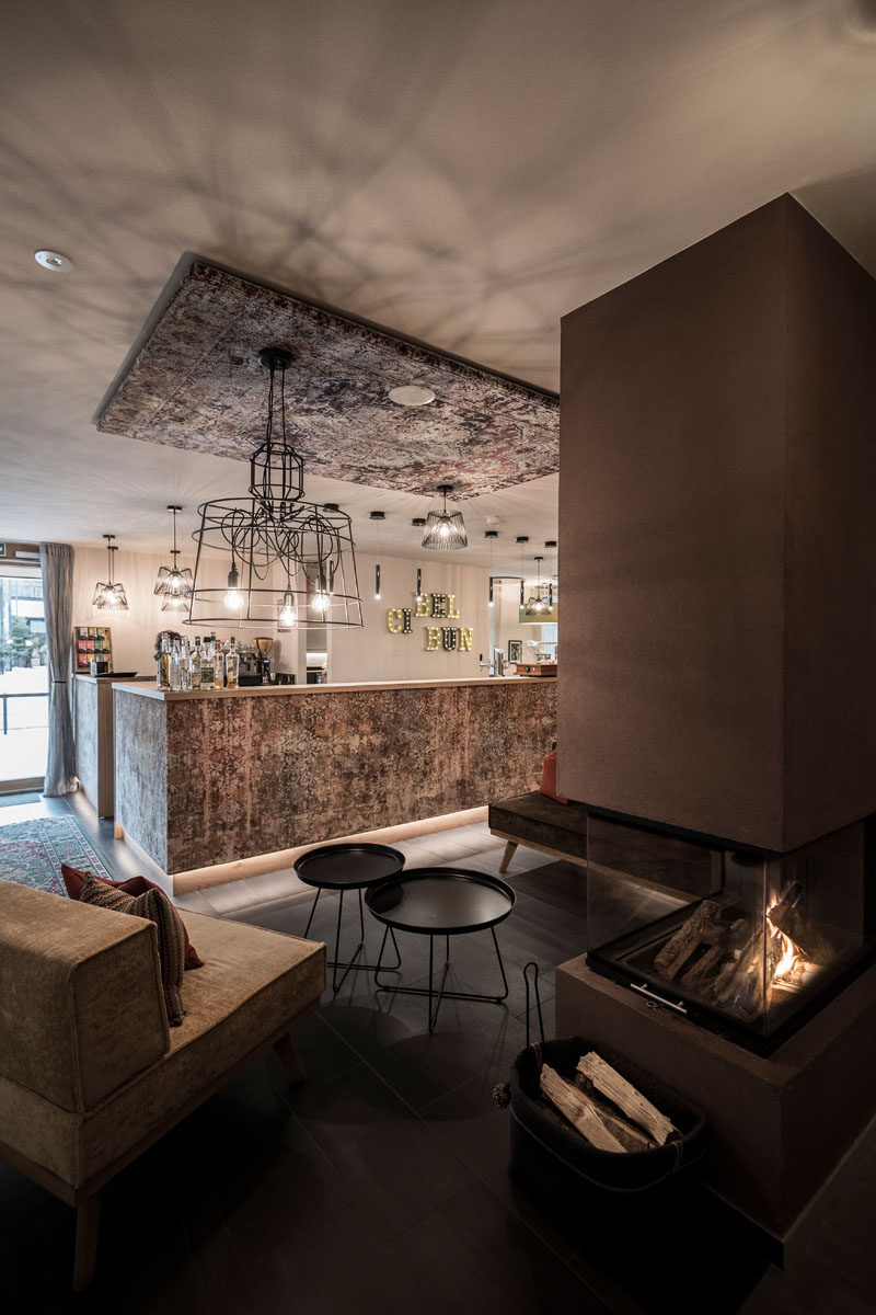 The various shades of warm brown hues and the fireplace make this hotel bar a welcoming place to wind down after a day of exploring.