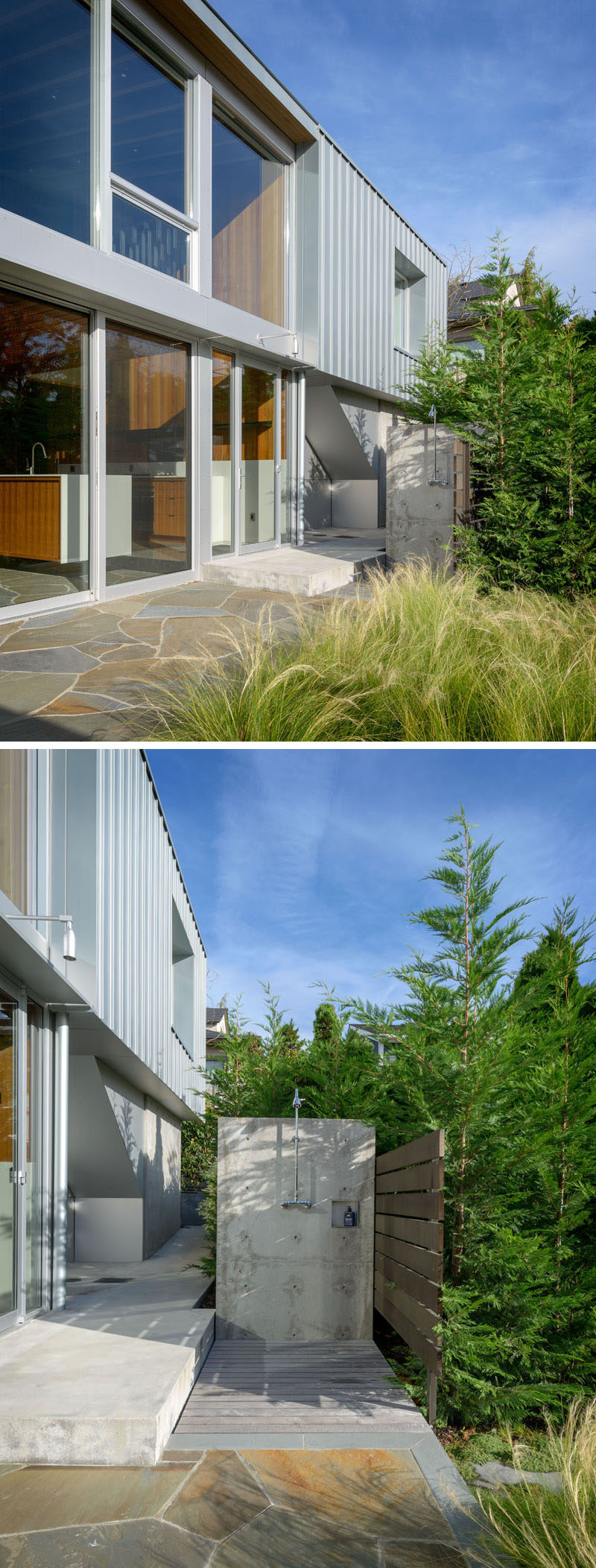 Before entering this modern waterfront house, there's an outdoor shower hidden by plants and a small fence, as well as a flagstone patio.