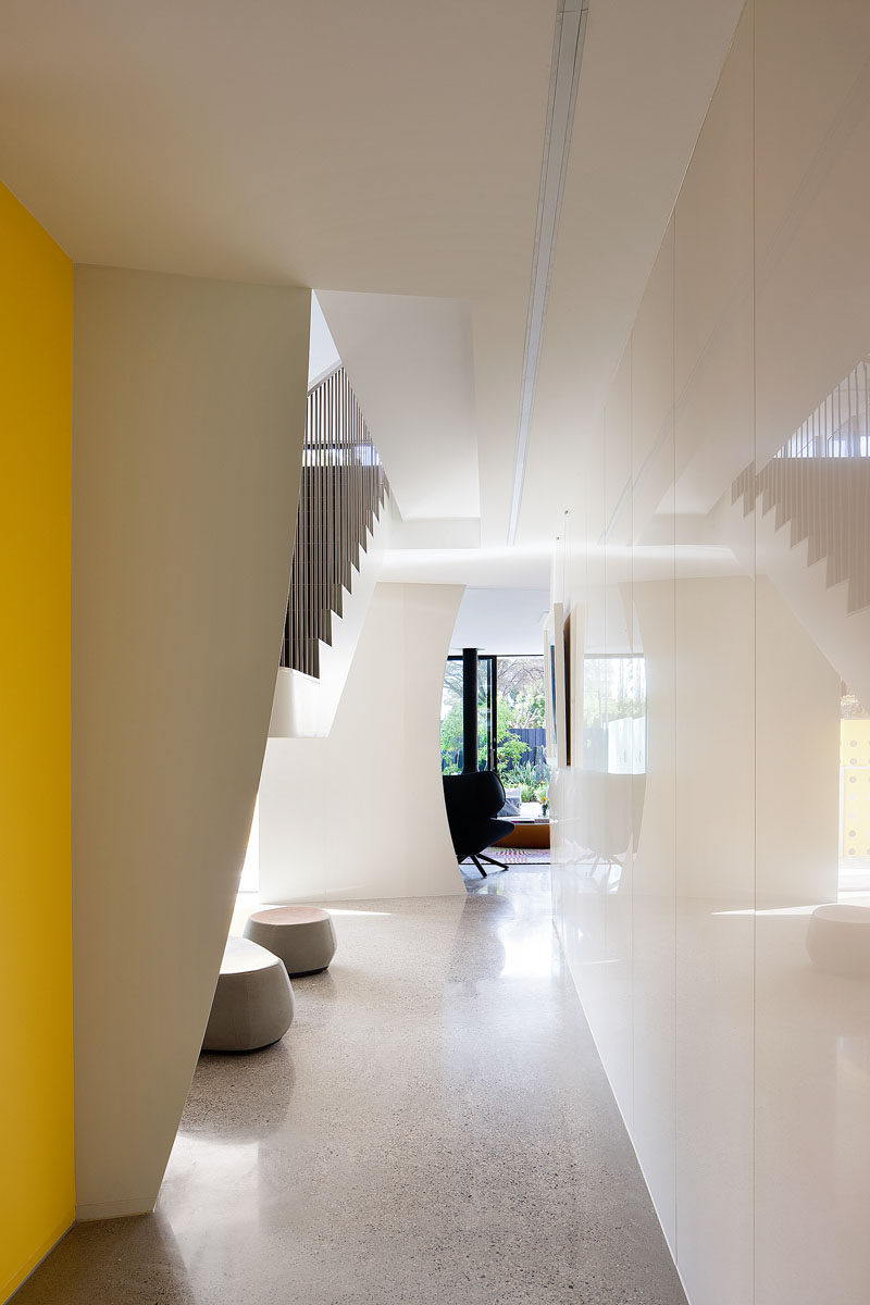 The flooring throughout this modern house is a hand-crafted polished concrete floor.