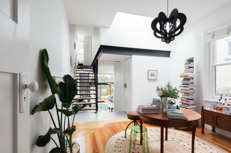 This renovated house has a small library before heading upstairs.