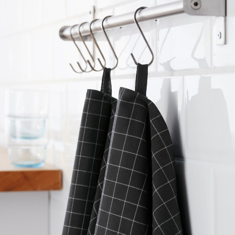 Keep on top of spills with these modern black tea towels that can easily be hung from hooks or casually draped over your shoulder while you work.