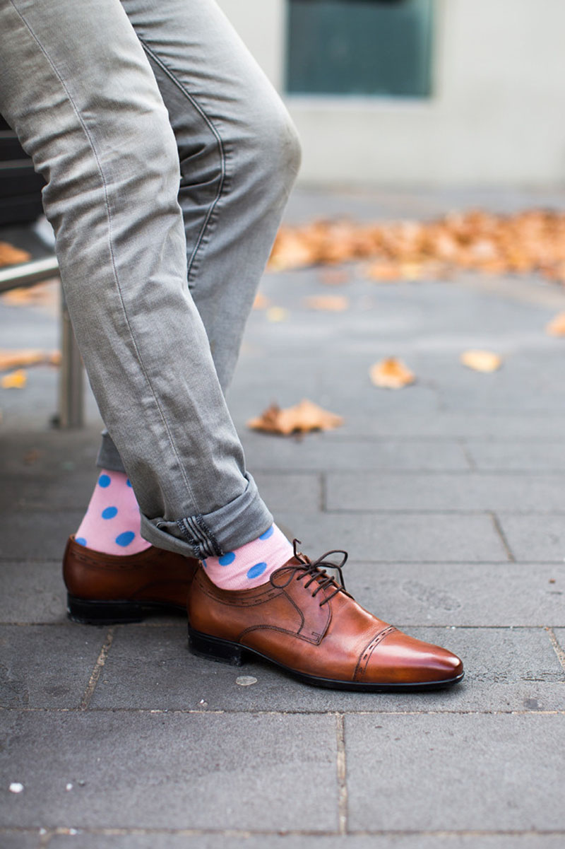 For a more subtle statement, these modern pink and blue polka dot socks are the perfect solution.