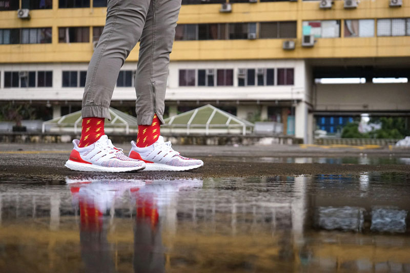 Evoke your inner super hero with these modern yellow and red lightning bolt pattern socks.