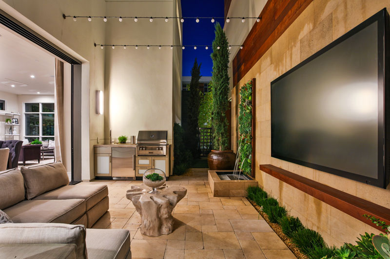 This modern small patio space has been created to flow from inside to outside, and is designed for entertaining. 