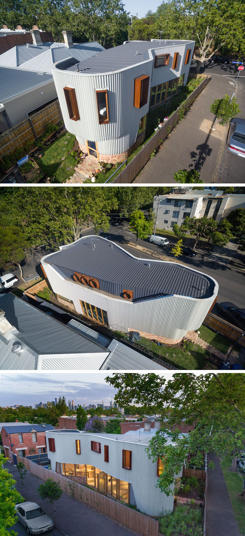 This modern house is covered in a custom made zig-zag metal facade that creates a continuous curving appearance, that sits on top of reclaimed brick and is broken up by rusted steel hoods around the windows.