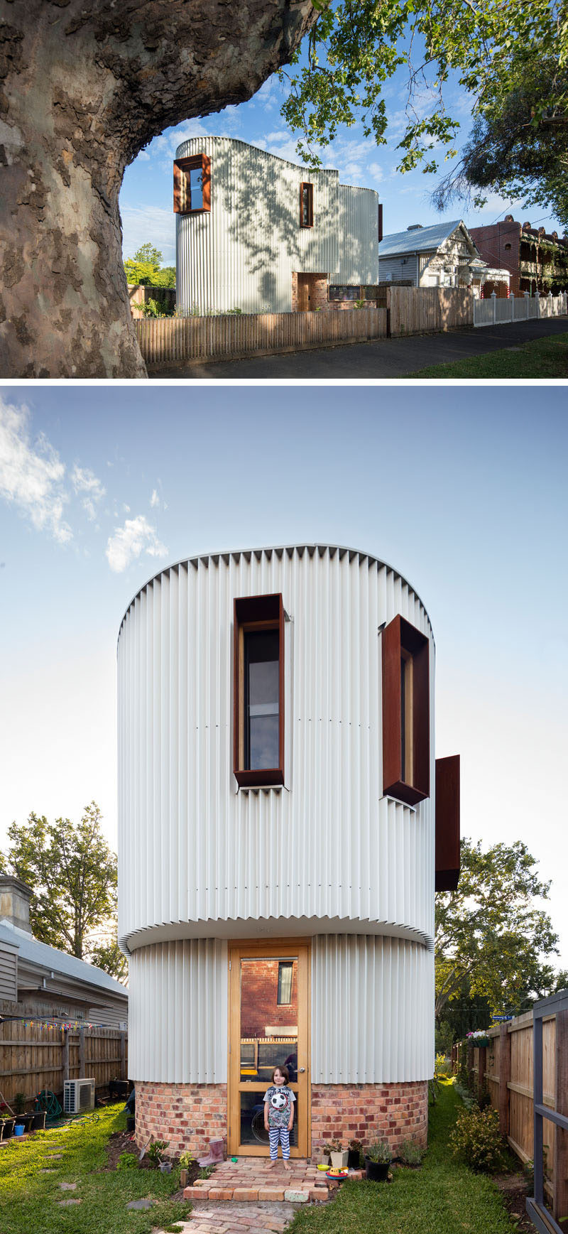 This modern house is covered in a custom made zig-zag metal facade that creates a continuous curving appearance, that sits on top of reclaimed brick and is broken up by rusted steel hoods around the windows.