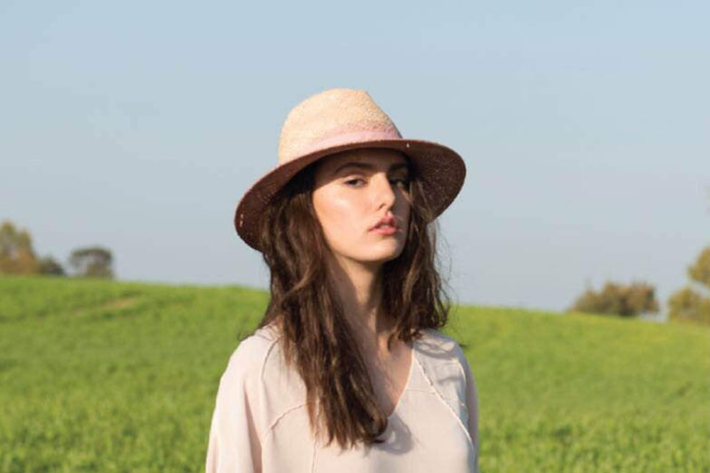 Yael Cohen, a fashion designer based in Israel, has created this light straw and pink Fedora as part of a collection of modern straw hats that are perfect for summer.