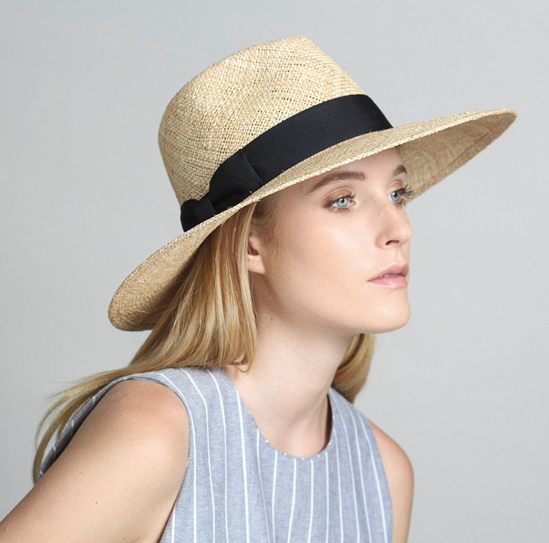 Yael Cohen, a fashion designer based in Israel, has created this white brim hat with black band as part of a collection of modern straw hats that are perfect for summer.