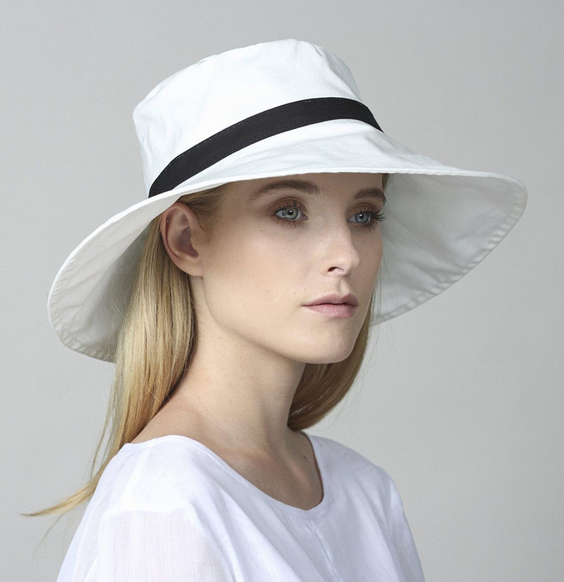 Yael Cohen, a fashion designer based in Israel, has created this white and black white brim hat as part of a collection of modern hats that are perfect for summer.