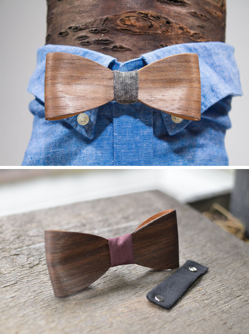 Thin, but sturdy strips of wood have been artistically shaped to form a modern bow tie that features a fabric centrepiece that attaches to an adjustable neck strap