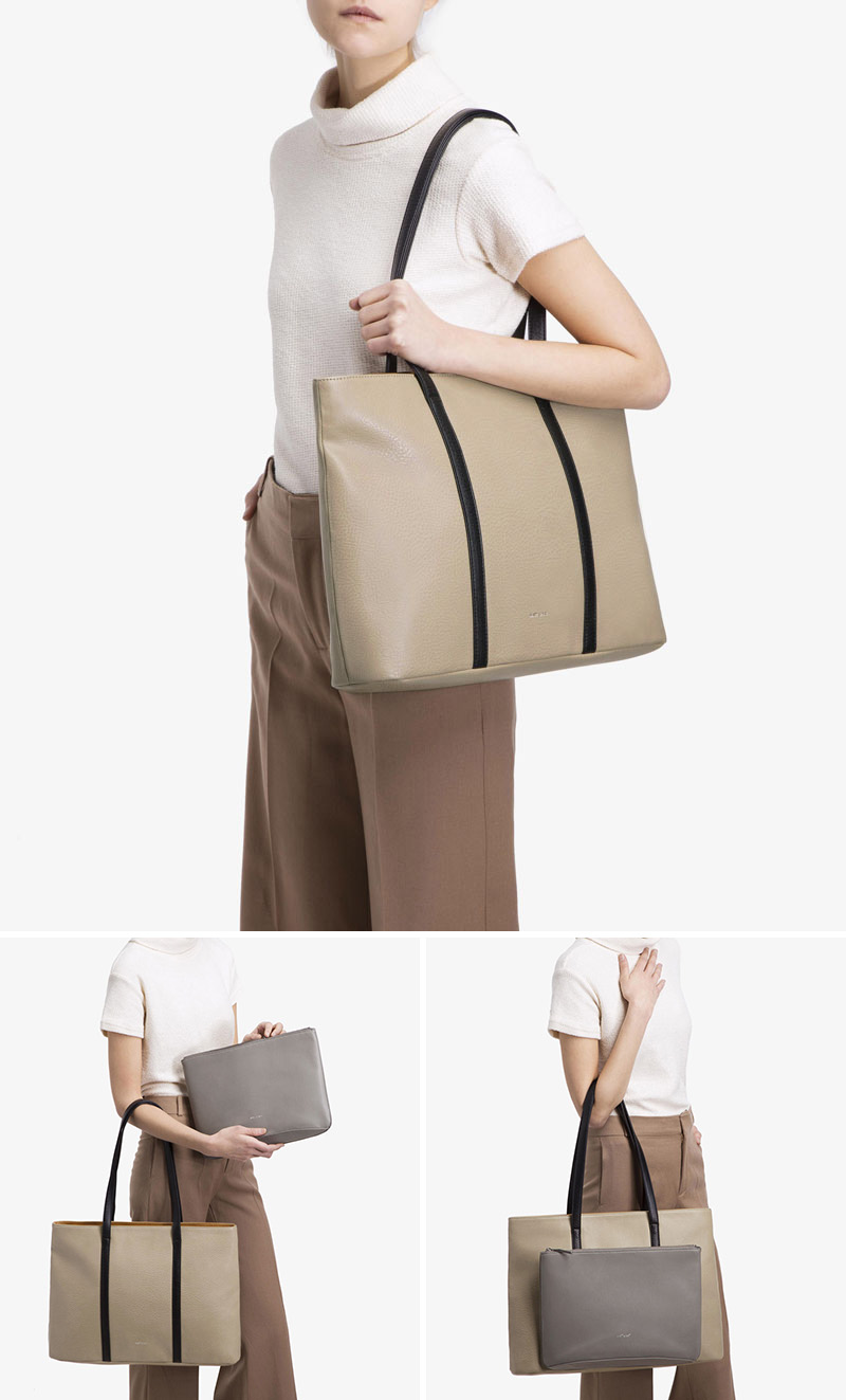 This modern sophisticated tote has two bags in one - the tote and a removable front clutch, both made from vegan leather