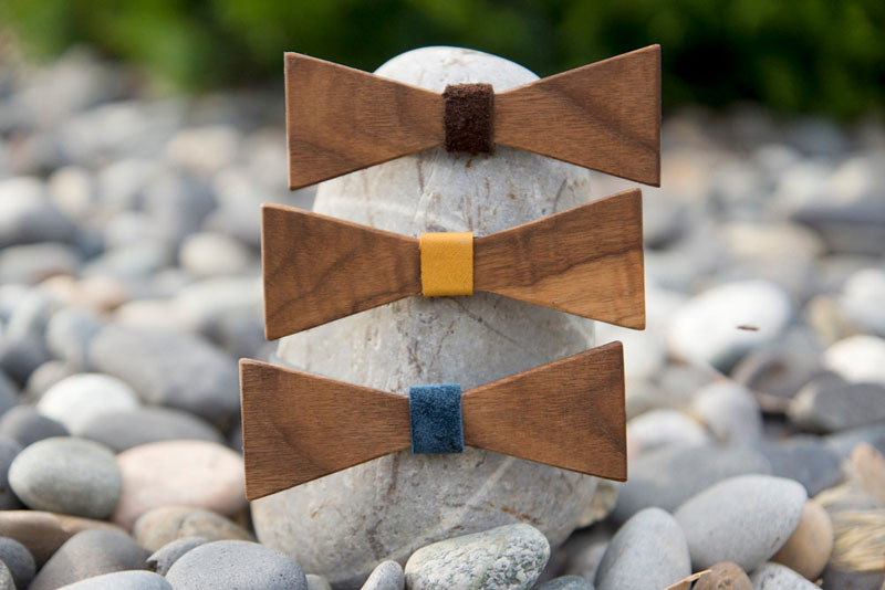 These angular, modern wood bow ties feature warm leather center pieces which add a little bit of color to the simple design, making them more unique for men's fashion.