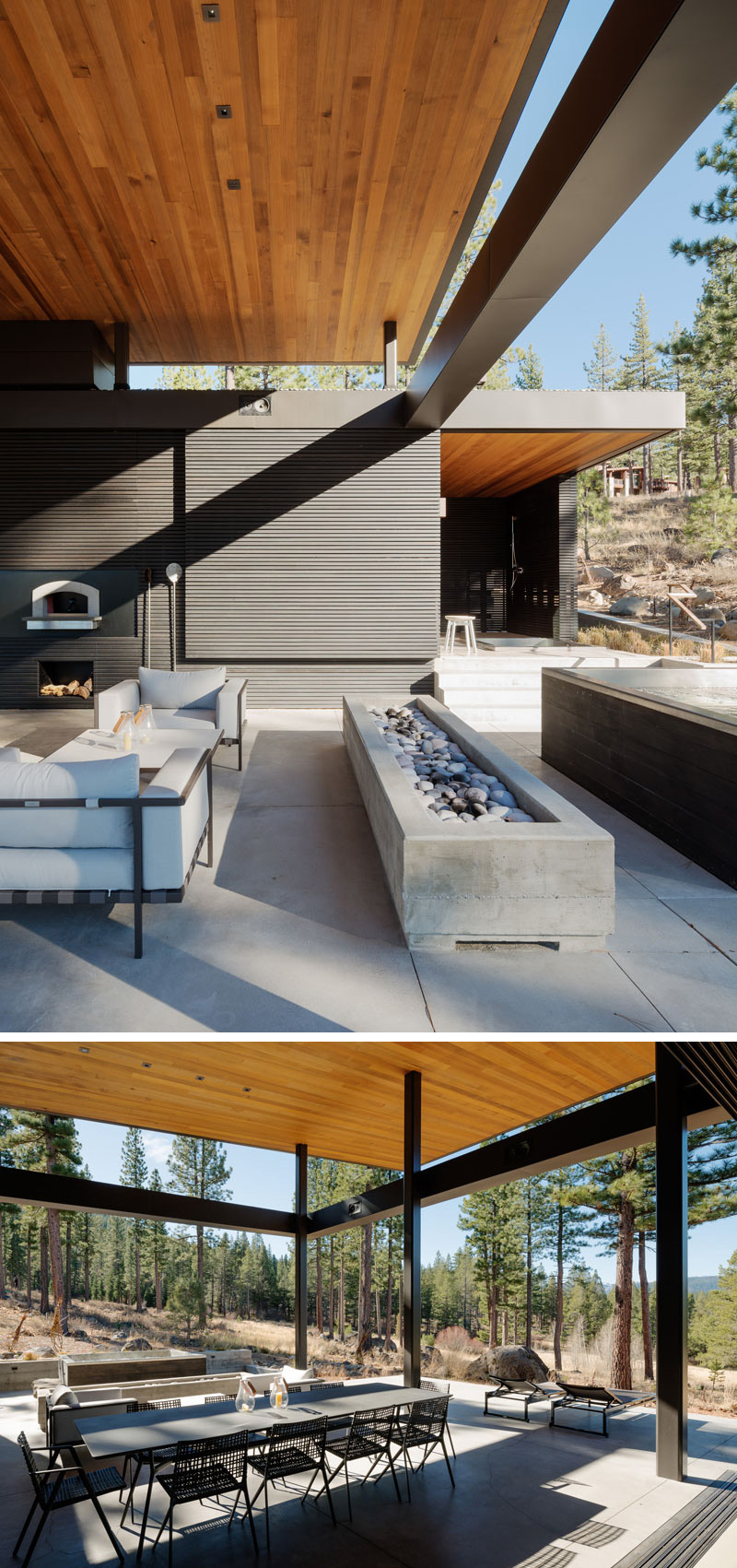 On the patio of this modern house, there's a long rectangular concrete firepit, a large metal table for dining, and two white upholstered sofa chairs, providing plenty of seating while eating dinner or using the outdoor pizza oven. A glass sliding wall can be used to separate this space from the kitchen inside.